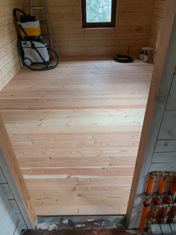 Flooring in guest bedroom installed